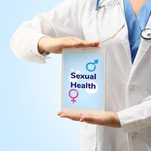 Doctor holding a sign up that says sexual health